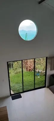 a room with a window with a view of the ocean at Villa Adelaida in San Rafael