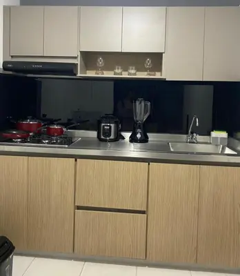 a kitchen with a sink and a counter top at Apartamentos SAN LUIS in San Luis