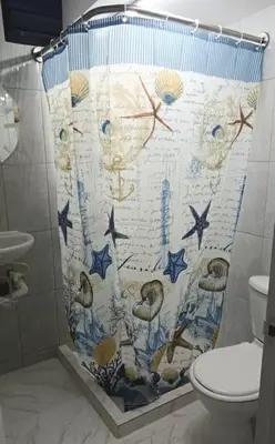 a bathroom with a shower curtain with stars on it at Oasis in Manila - El Poblado Estilo y Comfort in Medellín