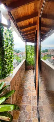 a balcony with a view of a city at Family accommodation in downtown Itagüí in Itagüí