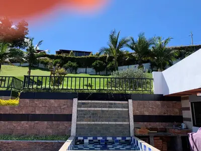 a set of stairs with a park in the background at Finca coraline in Guarne
