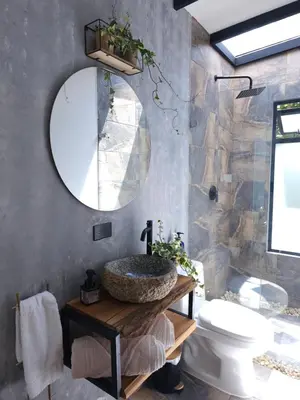 a bathroom with a sink and a mirror at Equilibrium glamping in Guarne