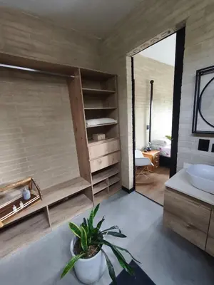 a bathroom with a sink and a plant in it at Casa Entre Montañas in Titiribí