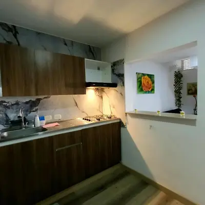 a kitchen with a sink and a counter top at Acogedor Y Amplio Aparta estudio En El Corazón De Manizales in Manizales