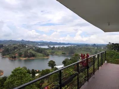 a view of a river from a balcony at Finca Villa Lake in Horizonte