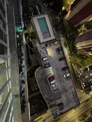 an aerial view of cars parked in a parking lot at Apartment in Itagui, excellent location in Itagüí