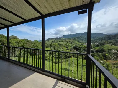 a view from the balcony of a house at FINCA DE RECREO y DESCANSO in El Bosque