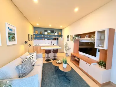 a living room with a couch and a table at Montecielo Lodge 11 El peñol - Guatape in Chiquinquirá