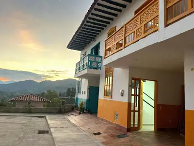 a building with a view of the mountains at Jerico Poets Balcony House in Jericó