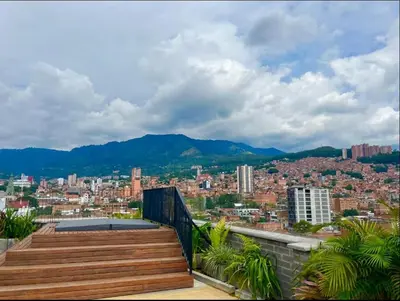 a view of a city from a balcony at Urban Loft in the center in Medellín