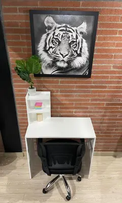 a black and white picture of a tiger on a wall at Urban Loft in the center in Medellín