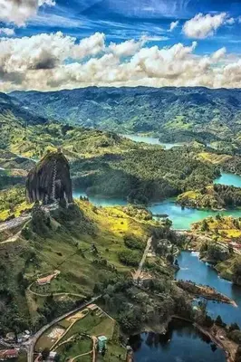 an aerial view of a mountain with water and trees at Apto full Ubicación Plazoleta Zocalos Plaza Ppal in Guatapé