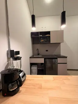 a kitchen with a blender and a counter top at Estrena Apartamento, Avenida Santander, Edificio BREAK in Manizales