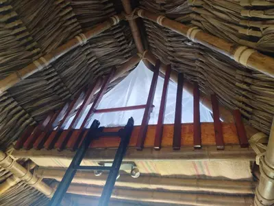 a straw roof with a window in it at Cabanas ecologicas con vista espectacular y cascada privada - Finca Qawana Ecolodge en San Carlos