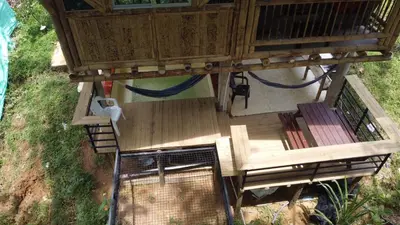 an overhead view of a wooden deck with a gazebo at Vip cabaña vista verde in Cocorná