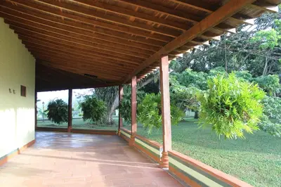 an empty porch of a house with a wooden roof at Rurals Casa in Marsella