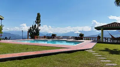a swimming pool with a view of the mountains at Rurals Casa in Marsella