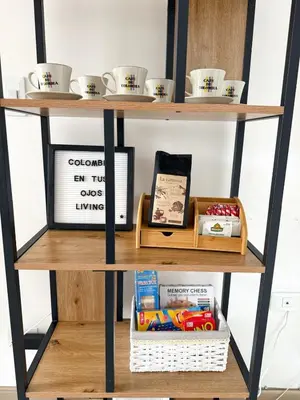 a shelf with toys and other items on it at Apartamento para 5 personas en Laureles, Estadio in Estación El Salto