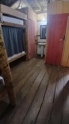 a room with a bathroom with a sink and a toilet at Familia Verde Eco Hostal in San Carlos
