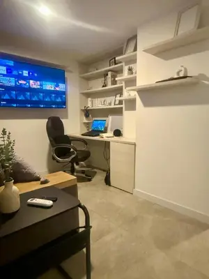 an office with a desk and a computer in a room at Eternal Springs 8pp, 3br, 2bt, 3acs, Pool, Jacuzzi in Medellín