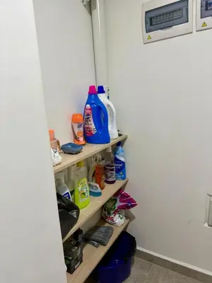 a closet with bottles of detergent and other items at Eternal Springs 8pp, 3br, 2bt, 3acs, Pool, Jacuzzi in Medellín