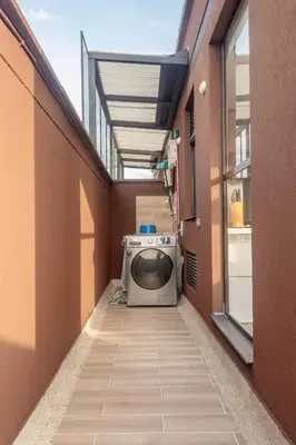 a washer and dryer in a hallway of a building at NOK Perfect 1BR in Laureles Medellin in Medellín