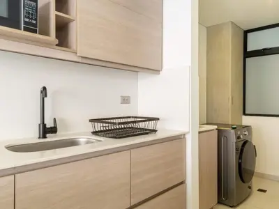 a kitchen with a sink and a dishwasher at NOK Perfect 3 BR with Balcony in Laureles Medellin in Medellín