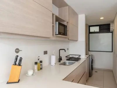 a kitchen with a sink and a counter top at NOK Charming 3BR in Laureles Medellin in Medellín