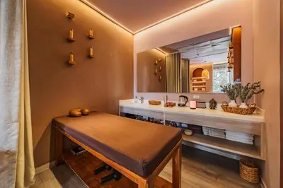 a bathroom with a table and a mirror at Mountain Views, AC, King Bed, Fast WiFi in Medellín