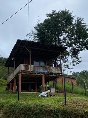 a house with a deck on top of it at Refugio de Sueños in San Rafael