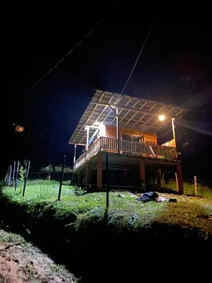a house with solar panels on the roof at night at Refugio de Sueños in San Rafael