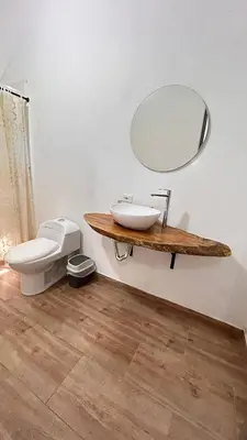 a bathroom with a sink and a toilet at Villa Serena Sopetran in Sopetran