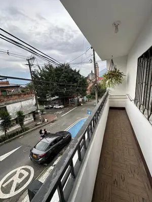 a car is parked on the balcony of a building at Hermoso apartamento en la milagrosa in Medellín