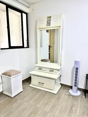 a white dresser with a mirror in a room at Apartamento Cocorna Aventura in Cocorná