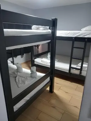 a group of bunk beds in a room at Apartamentos laureles Estadio in Medellín