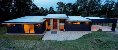 a small blue house with lights on top of it at Linda Vista in Rionegro
