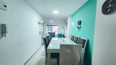 a dining room with a table and chairs at Beautiful Duplex Apt in Cabañas Bello Antioquia in Medellín