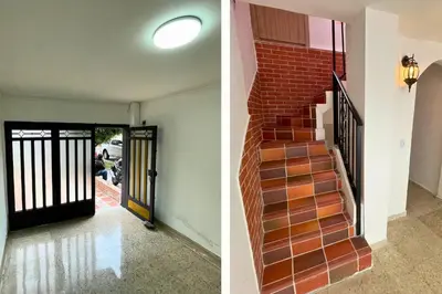 a staircase in a house with a brick wall at Edificio Casa Anita in Medellín