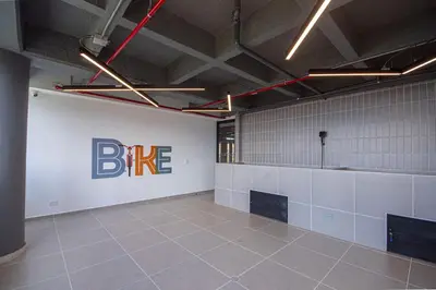 a large room with a bne sign on the wall at Modern apartment - Pool, Gym, and Coworking Space in Envigado