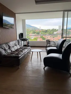 a living room with a couch and two chairs and a table at Apto Citadela Di Sole in Santa Fe de Antioquia