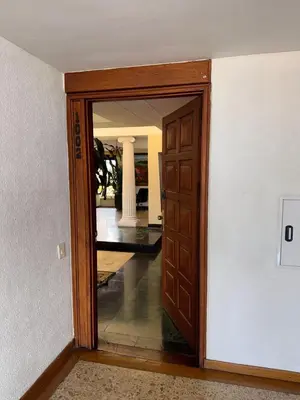 an open door in a room with a hallway at Penthouse Rio Claro 1002 in Medellín