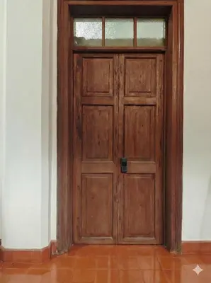 a wooden door with a window in a room at Casa Epoca Dorada in Medellín