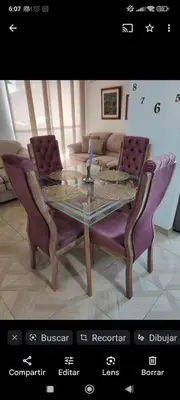 a dining room table with purple chairs and a glass top at Hermosa habitación con múltiples áreas comunes in Bello