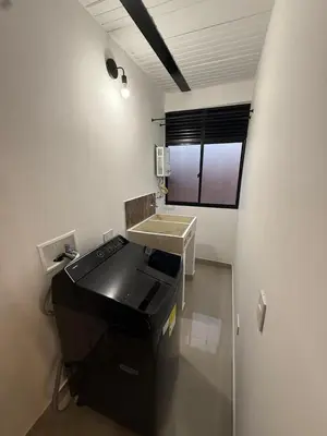 a bathroom with a sink and a counter top at Apartamento nuevo, moderno y acogedor in Itagüí