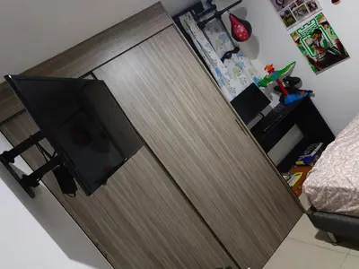 a door with a television on it in a room at Edificio sefi in Medellín