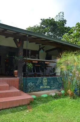 a building with a sign that says sahuarma at Selvática Ecohotel y Centro Holístico in San Carlos