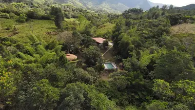 an aerial view of a house in the middle of a forest at Selvática Ecohotel y Centro Holístico in San Carlos