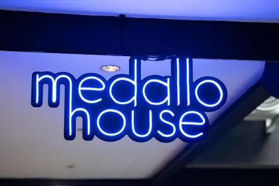 a sign that says media house on the side of a car at Provenza luxury parque Lleras D'house, happy house in Medellín