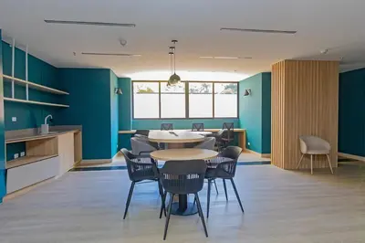 a dining room with a table and chairs at El Poblado Prime Location Medellin Apt in Medellín