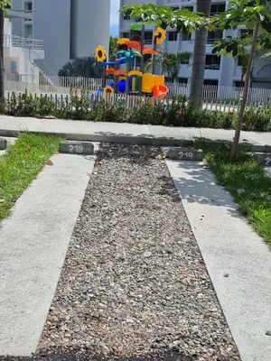 a park with a playground with a play equipment at Apartasol Moderno bajo el Sol de Santa Fe in Santa Fe de Antioquia